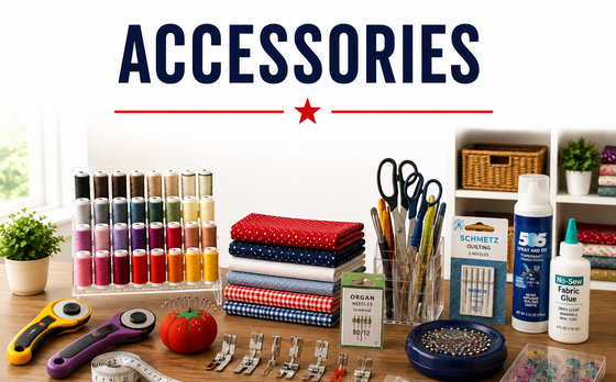 Sewing accessories including thread spools, bobbins, scissors, measuring tape, sewing clips, pins, zippers, and folded fabric