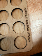 Aurifil Unnumbered Thread Storage Tray, 64 Spools — close-up of the Aurifil spool-size engraving
