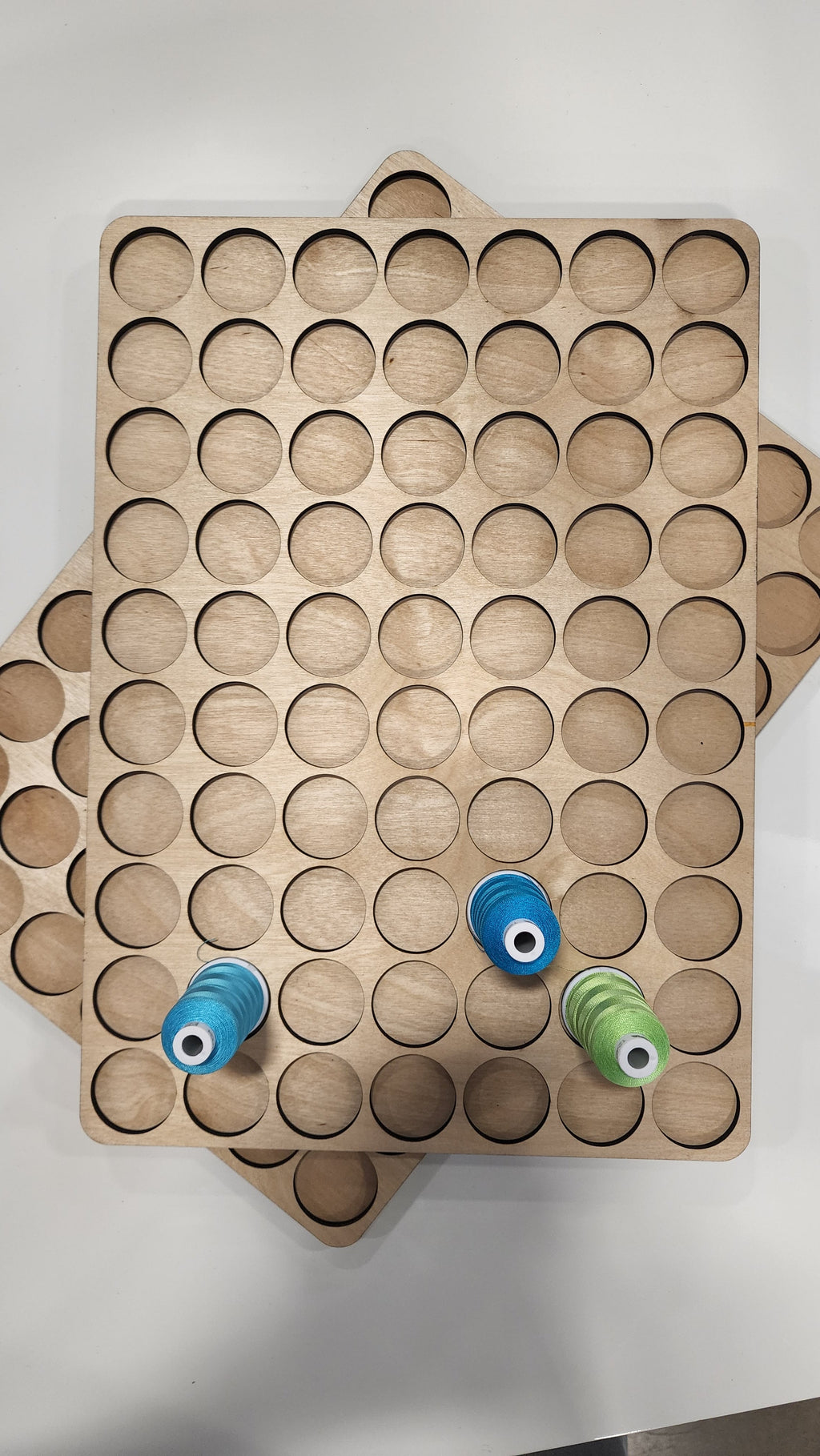 IKEA ALEX 6-Drawer Thread Storage Tray Inserts — overlapping Aurifil-size trays with two sample spools