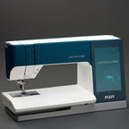 PFAFF sewing machine on a dark background