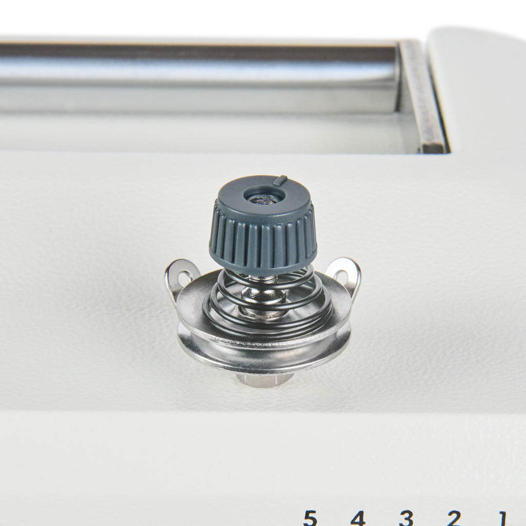 Upper thread tension assembly on Barracuda Command 700BZ