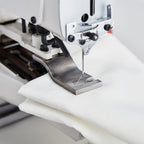 Reliable 8100DT drapery tacker in use