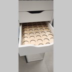 IKEA ALEX 9-Drawer Thread Storage Tray Inserts — empty trays inside an open drawer