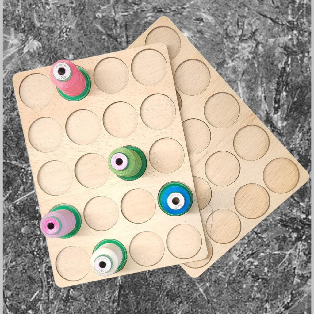 IKEA ALEX 9-Drawer Thread Storage Tray Inserts — overlapping trays with sample thread spools on a tabletop
