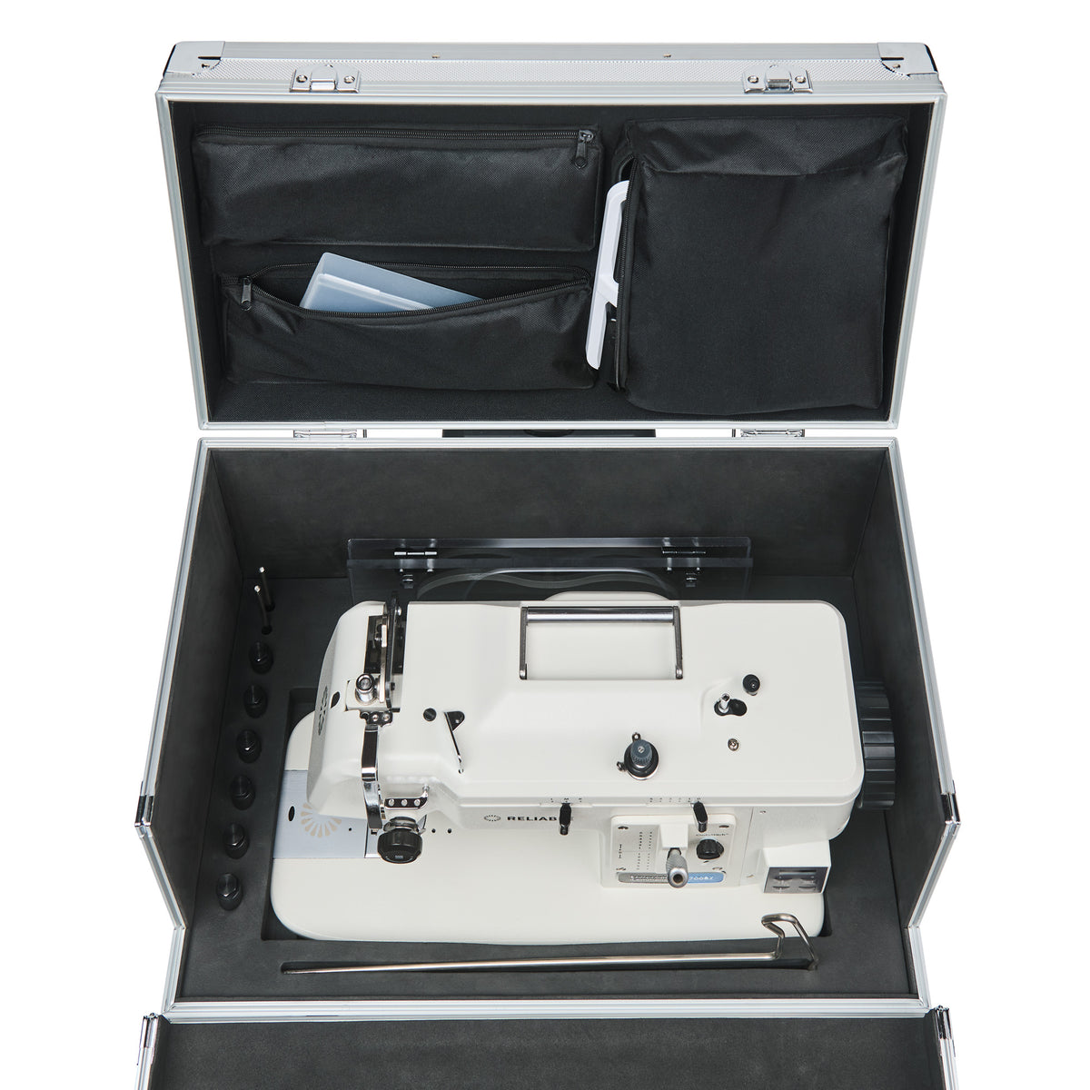 CudaCase open with sewing machine and accessories organized inside