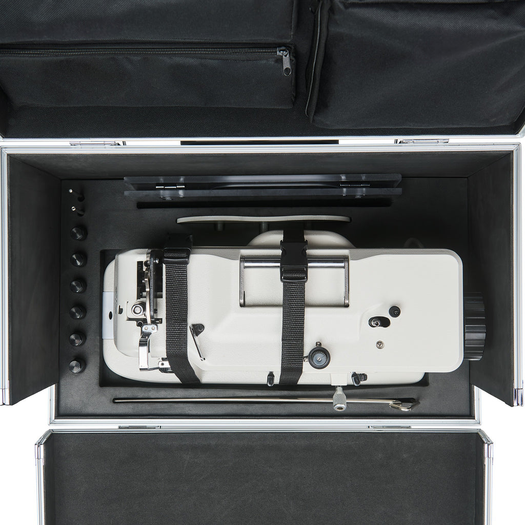 Sewing machine and accessories secured by the CudaCase internal strap