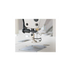 JUKI DDL-8700-7 lockstitch machine needle, presser foot and stitch area detail from JUKI