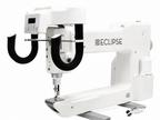 A white industrial sewing machine with a digital control panel and black curved guide arms, branded ECLIPSE, shown on a plain white background.