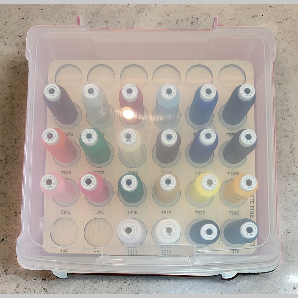 Exquisite Fine Line 60wt Thread Storage Tray, 30 Spools — filled tray beneath a closed clear case lid