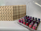 Isacord Numbered Thread Storage Trays, Set of 18 — stacked trays beside a filled tray in an open case