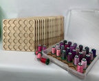 Isacord Numbered Thread Storage Trays, Set of 18 — numbered trays beside a clear case holding sample spools
