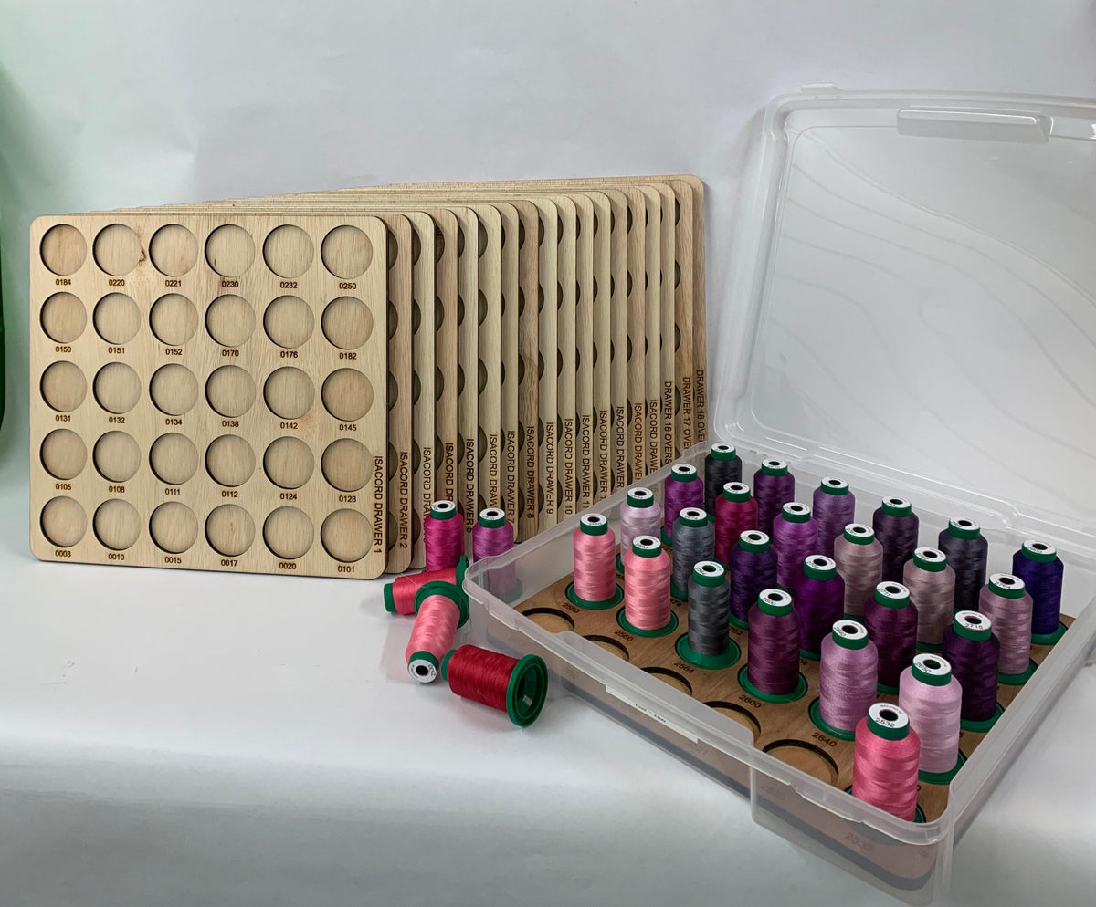 Isacord Numbered Thread Storage Trays, Set of 18 — numbered trays beside a clear case holding sample spools