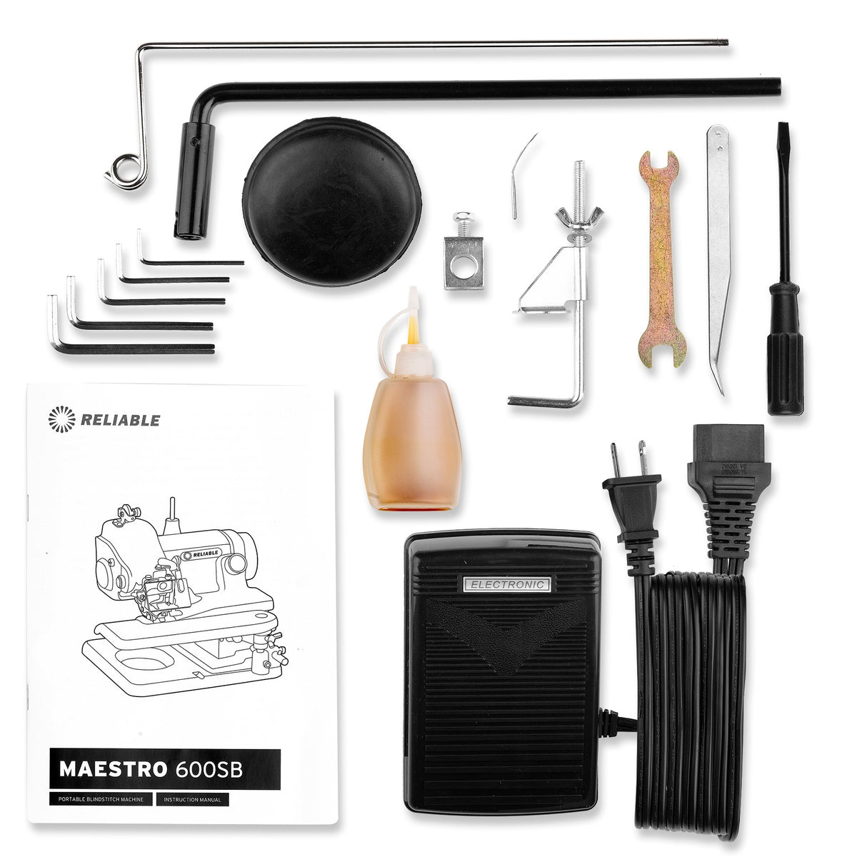 Reliable Maestro 600SB blindstitch sewing machine and included accessories