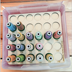 DIME Medley Variegated Thread Storage Tray, 30 Spools — filled tray inside an open clear case