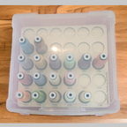 DIME Medley Variegated Thread Storage Tray, 30 Spools — tray and thread beneath a closed clear lid