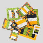 Embroidery Garden Pieced and Quilted Mats included in Mug Rugs and Coasters Bundle