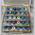 Robison-Anton Numbered Thread Storage Trays, 540 Spools — tray filled with blue and neutral thread in an open clear case