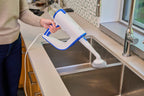 Steamboy Plus 350CS brush cleaning a kitchen sink
