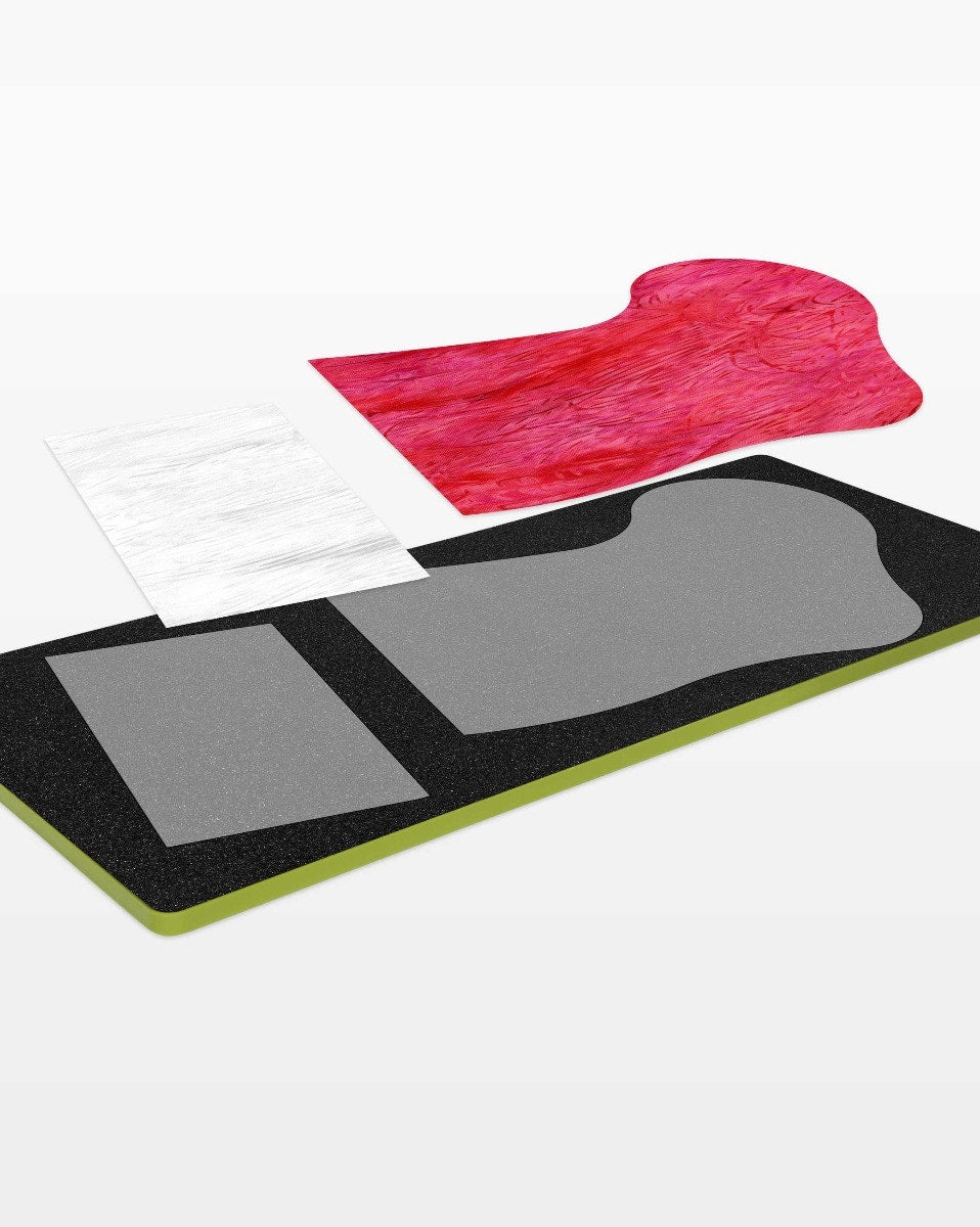 Fabric positioned on the AccuQuilt GO! Santa Stocking Die