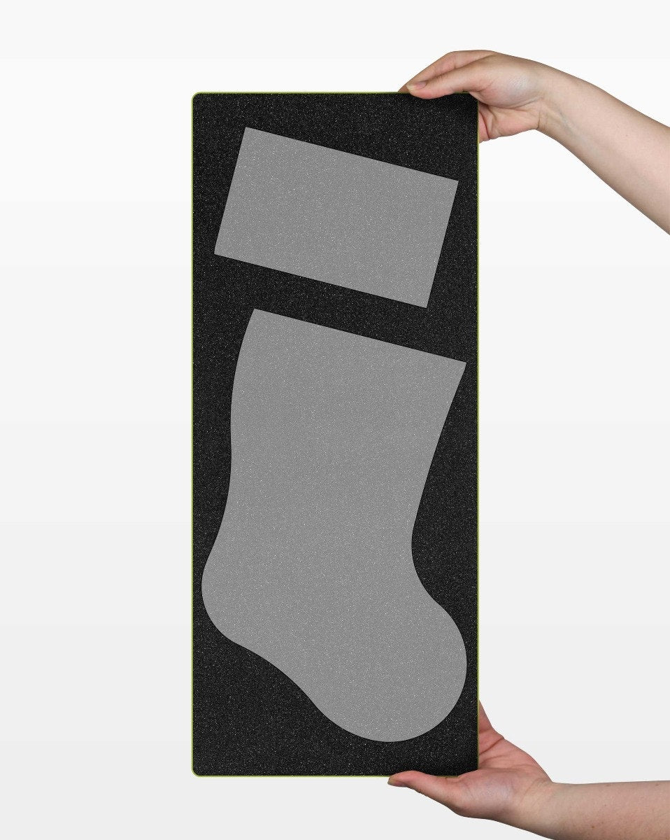 Cutting stocking fabric with the AccuQuilt GO! Santa Stocking Die