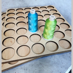 IKEA ALEX 5-Drawer Thread Storage Tray Inserts — close-up of two spools seated in a wooden tray