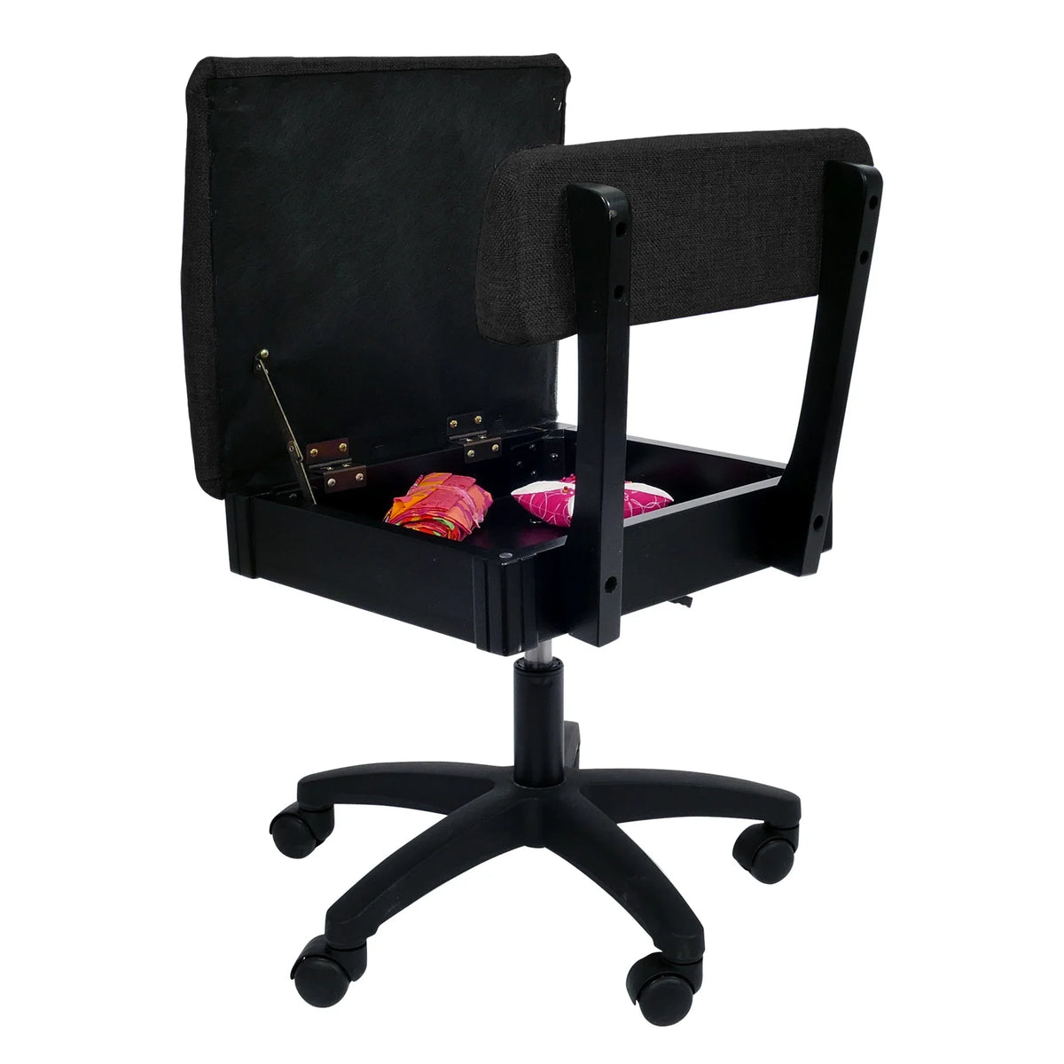 Arrow Baroness Black Hydraulic Sewing Chair – open seat storage compartment with sewing notions inside, paired with black textured upholstery.