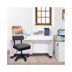 Arrow Lady Gray Hydraulic Sewing Chair in sewing room setup – ergonomic gray swivel chair paired with white sewing cabinet and machine.