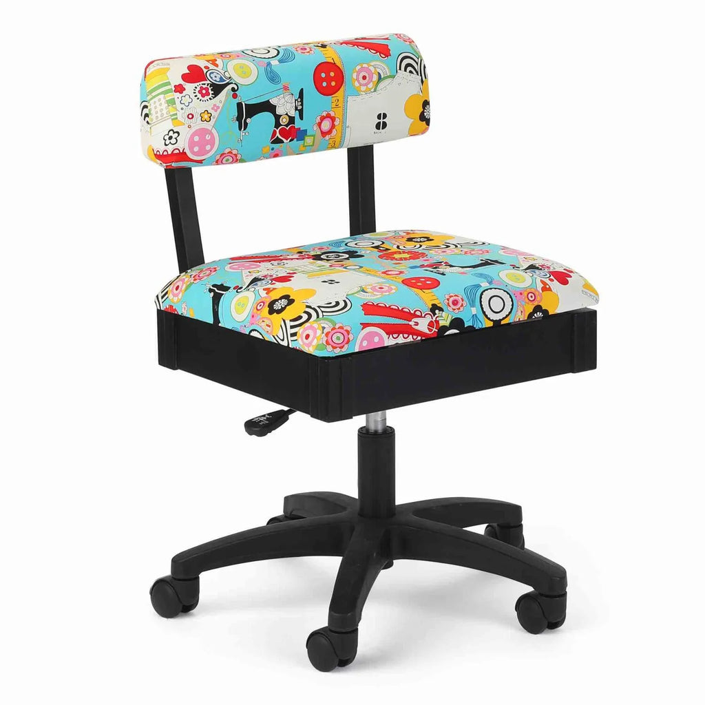 Arrow Sew Wow Hydraulic Sewing Chair – front angle view with colorful sewing-themed upholstery, ergonomic backrest, and height-adjustable swivel base.