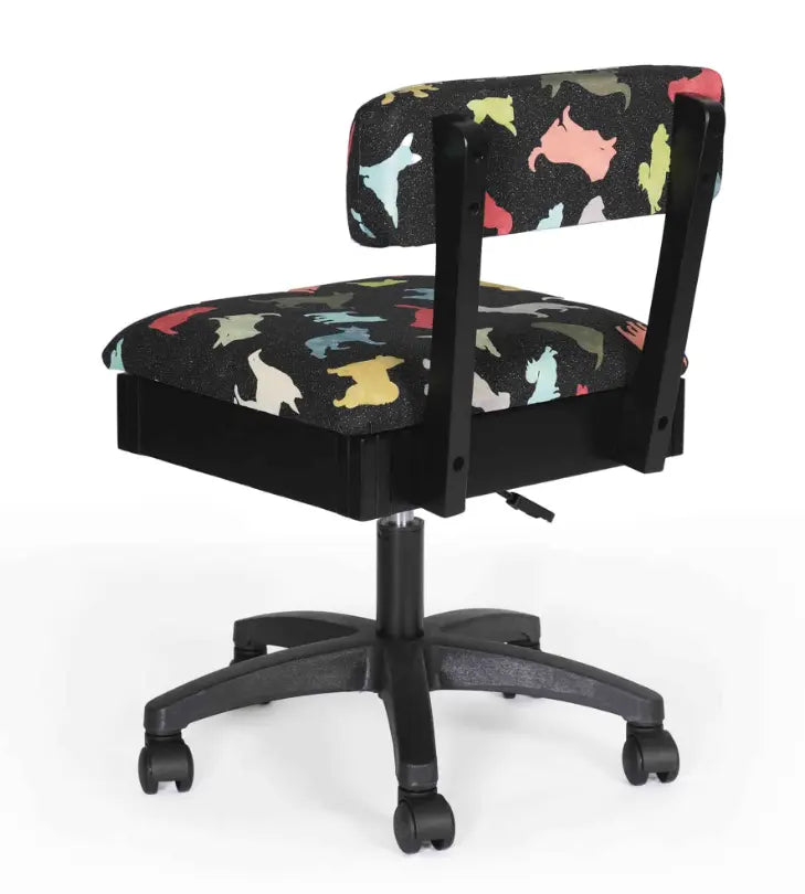 Arrow Dog’s Meow Hydraulic Sewing Chair Black – rear angle view highlighting durable dog-print upholstery, supportive backrest, and smooth-rolling casters.