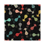 Arrow Cat’s Meow Sewing Chair Black – close-up of multicolor whimsical cat-pattern fabric design on black background.