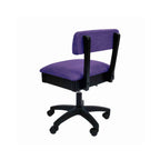 Arrow Royal Purple Hydraulic Sewing Chair – rear angle view showing textured purple fabric, supportive backrest, and smooth-rolling caster wheels.