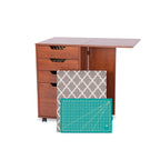 Kangaroo Kiwi Storage Cabinet in Teak K7105 with drawers, removable ironing board, and cutting mat