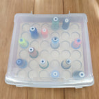 Blank Embroidery Thread Storage Tray, 36 Spools — tray and spools beneath a closed clear case lid