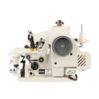 Consew 75T blindstitch machine side view showing the handwheel, motor housing, and power connection.