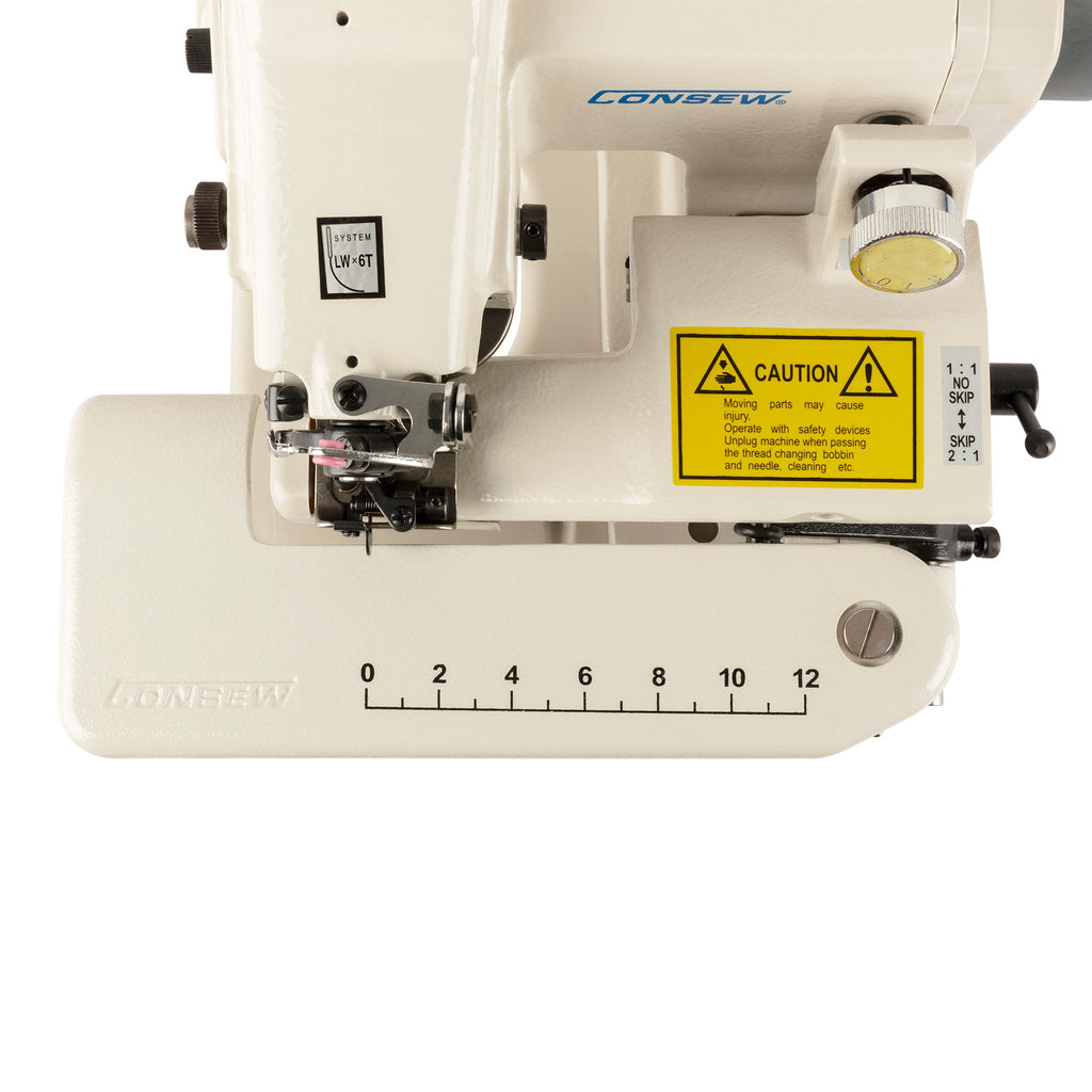 Consew 75T work plate with printed measurement scale and stitch area.