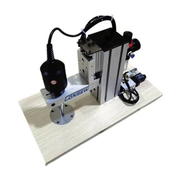 Consew USW-PPE ultrasonic spot welding machine complete unit with control and work surface.