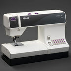 PFAFF sewing machine on a dark background
