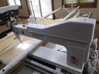 Eclipse VARSITY 26 long arm quilting machine installed on its frame in a home quilting room