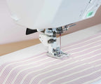Elna eXcellence 710 presser foot stitching fabric