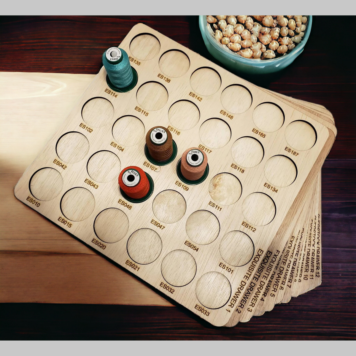 Exquisite Embroidery Thread Storage Trays, 360 Spools — angled overhead view with several sample spools