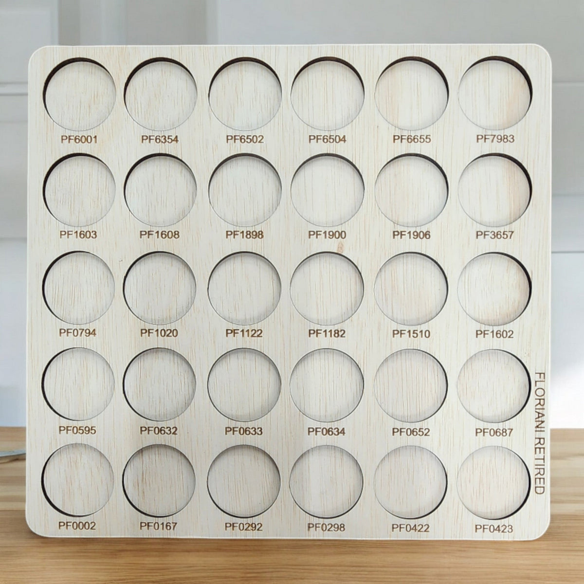 Floriani Retired Colors Thread Storage Tray, 30 Spools — front view of an empty numbered tray
