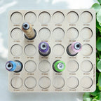 Floriani Retired Colors Thread Storage Tray, 30 Spools — overhead view with sample thread spools