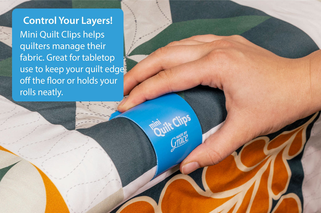 Grace Company Mini Quilt Clips (1.5” Diameter) — blue mini clip holding fabric