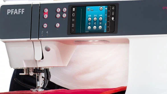 Sewing machine with digital display and control panel, featuring the PFAFF brand.