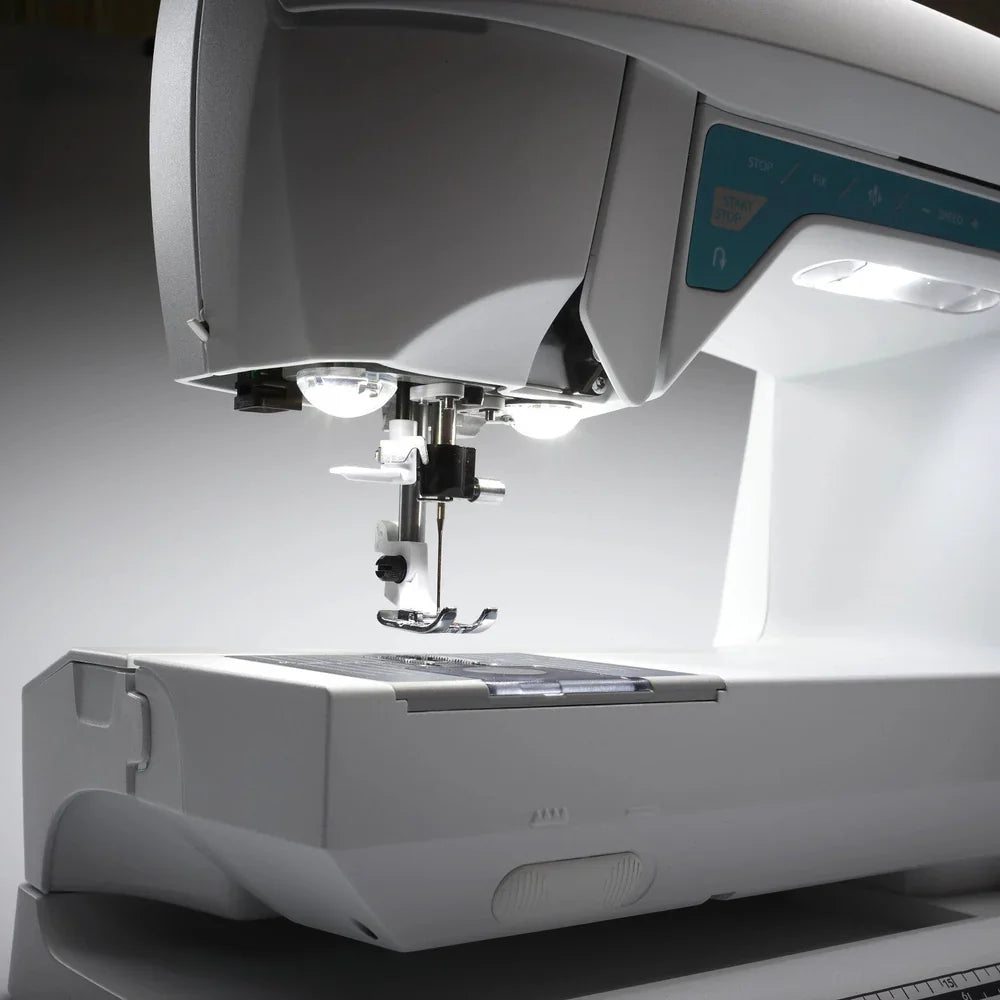 Husqvarna Viking Opal 650 sewing machine needle area illuminated by LED lights for precision stitching and clear visibility
