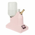 Jiffy J-1 Pink Original Hat Steamer with brass hat nozzle in tabletop configuration