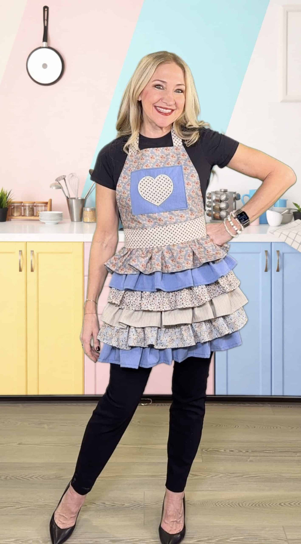 Black Hestia Apron in a pastel kitchen