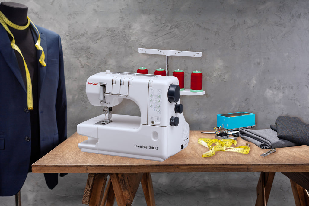 Janome CoverPro 1000CPX shown in a sewing workspace