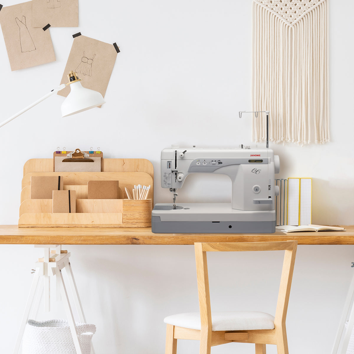Janome 1600P-QC shown in a sewing workspace