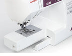 Janome 2030DC-G sewing machine with removable extension table for free-arm sewing and small project access.